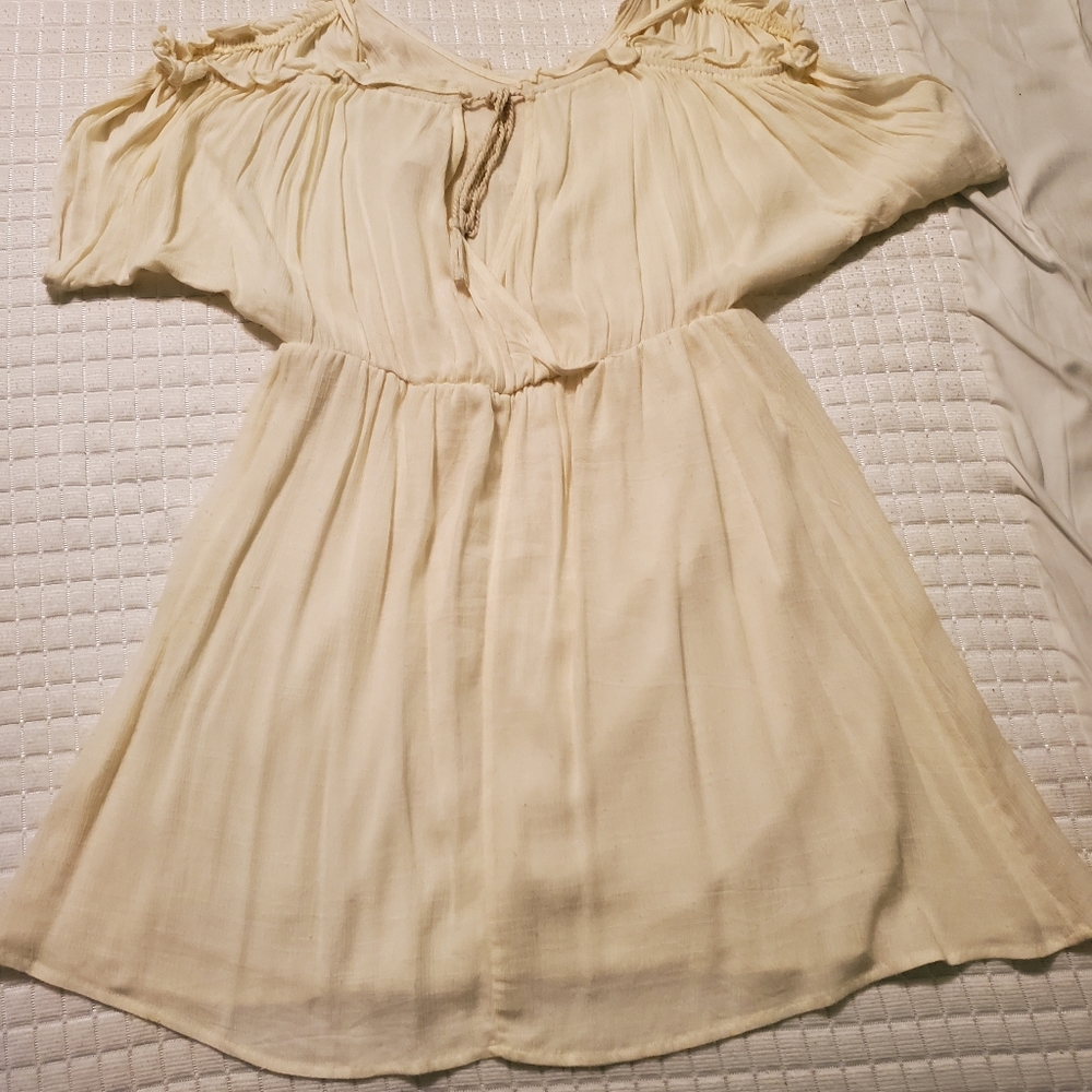 Flying tomato cream dress in size m